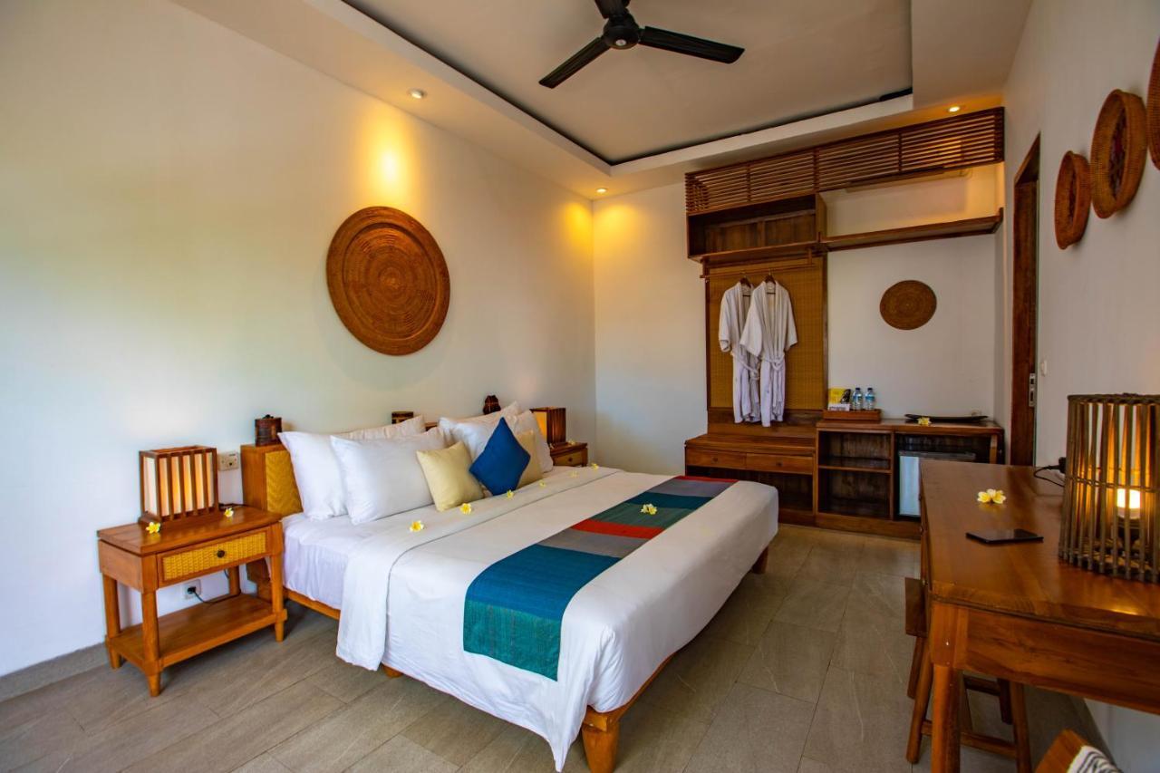 Gili Sands Hotel & Bar Гили Траванган Экстерьер фото
