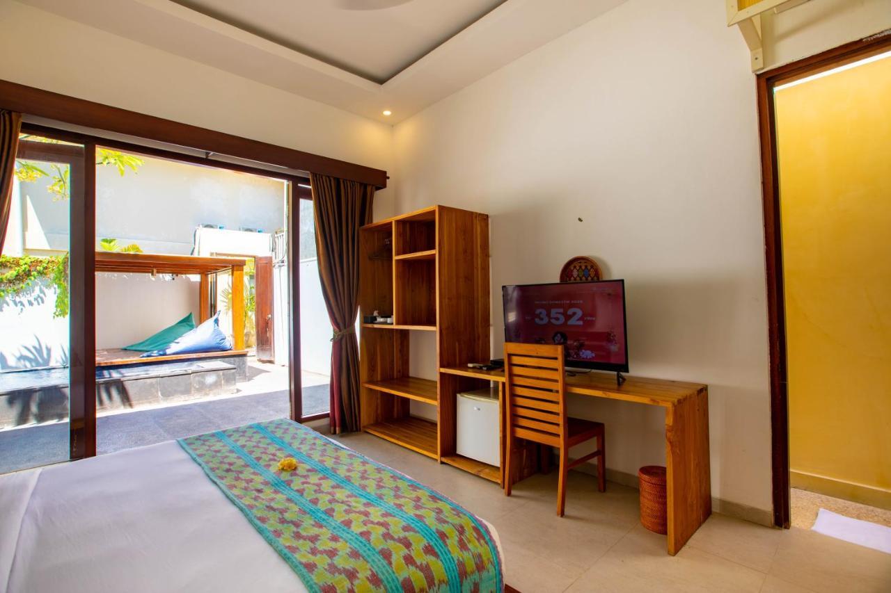 Gili Sands Hotel & Bar Гили Траванган Экстерьер фото