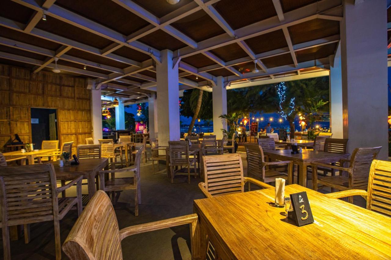 Gili Sands Hotel & Bar Гили Траванган Экстерьер фото