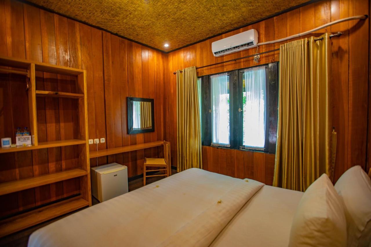 Gili Sands Hotel & Bar Гили Траванган Экстерьер фото